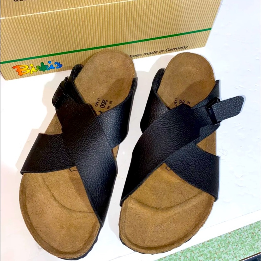 Women’s Birkenstock size 9/ men’s 7